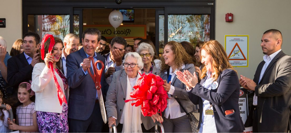 Northgate Market family cutting a ribbon on a new store