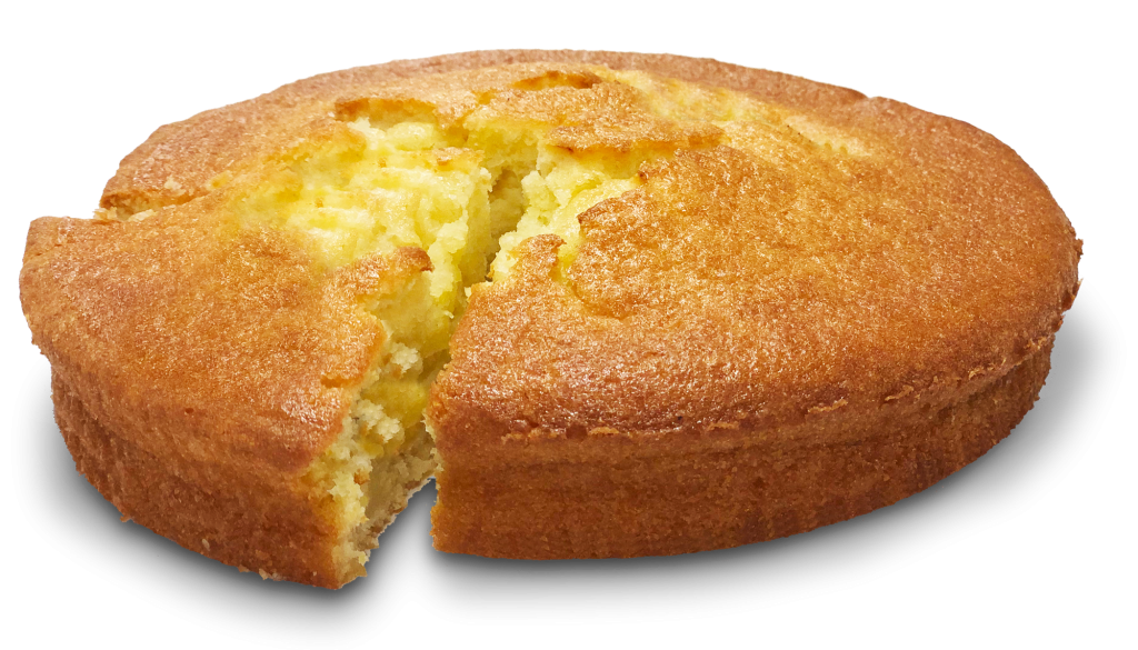 Pan de Elote (corn bread) with a slice cut out