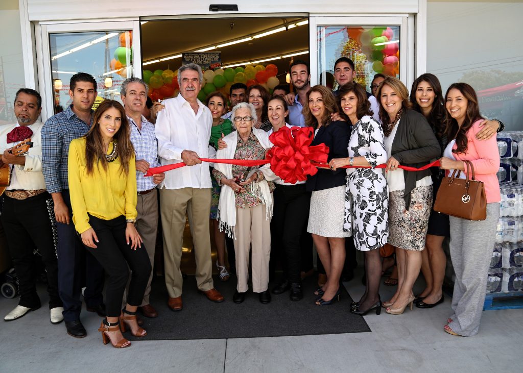 Northgate employees cutting the ribbon on a new store