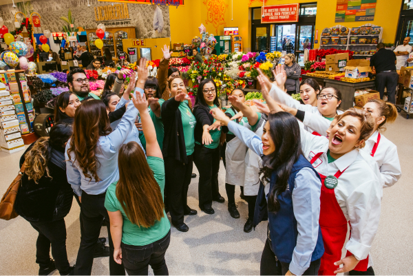 Northgate Market employees in a team huddle