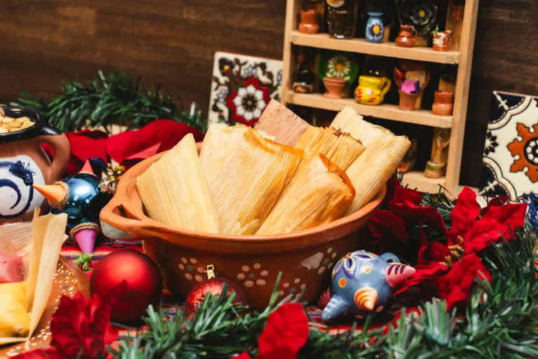 image of tamales with holiday decor surrounding