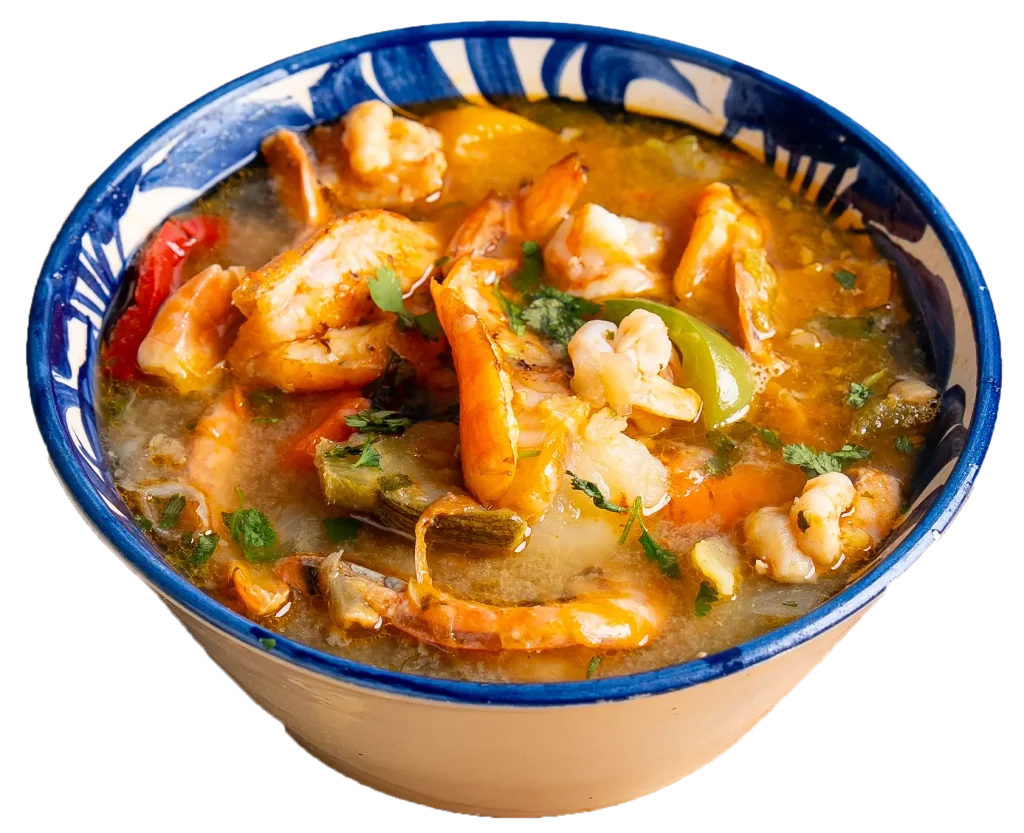 Caldo de camarón shrimp soup with vegetables, cilantro, and lime